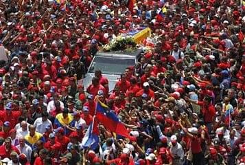 The coffin of Venezuela's late President Hugo Chavez is driven through the streets of Caracas after leaving the military hospital where he died of cancer, in Caracas March 6. Photo: Reuters