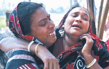 Nipu Sheel, whose house had been grounded on March 2, breaks into tears seeing a relative. They deserve safety and justice rather than pity after such events take place. Photo: Anurup Kanti Das