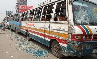 Apparel workers vandalise buses on Chandona intersection on Dhaka-Mymensingh highway in Gazipur Thursday morning protesting the death of their fellows in Savar building collapse. Photo: STAR
