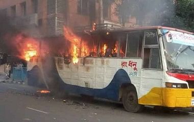 A bus goes up in flames after miscreants set it on fire near the capital's Kakrail intersection on Sunday. Photo: STAR