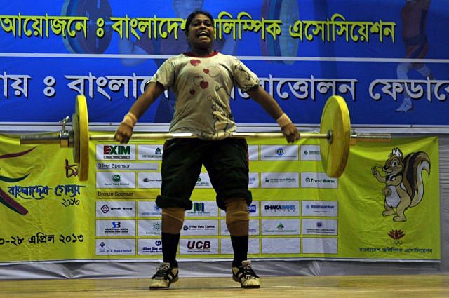 Roksana Sultana of Bangladesh Ansar won the 69kg weight gold on the final day of the Bangladesh Games at the NSC Gymnasium yesterday.  Photo: Star 