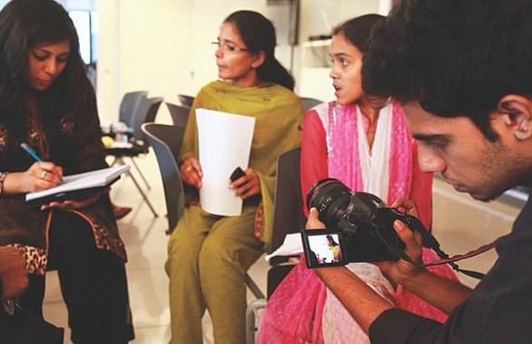 Volunteers from the department of media and communication getting ready to take video interviews. Photo: Kazi Tahsin Agaz Apurbo