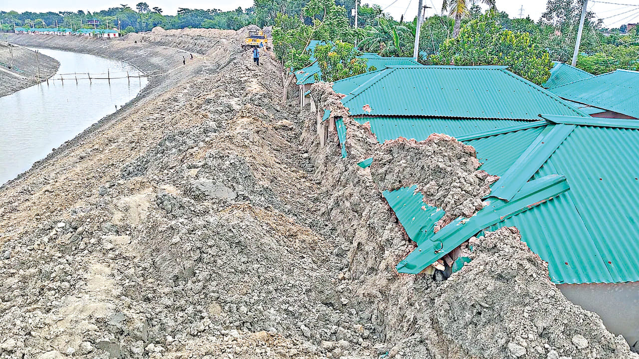 Massive mounds of excavated riverbed clay piled against homes, turning a government-built sanctuary into a structural hazard. Photos: Md. Al-Mamun