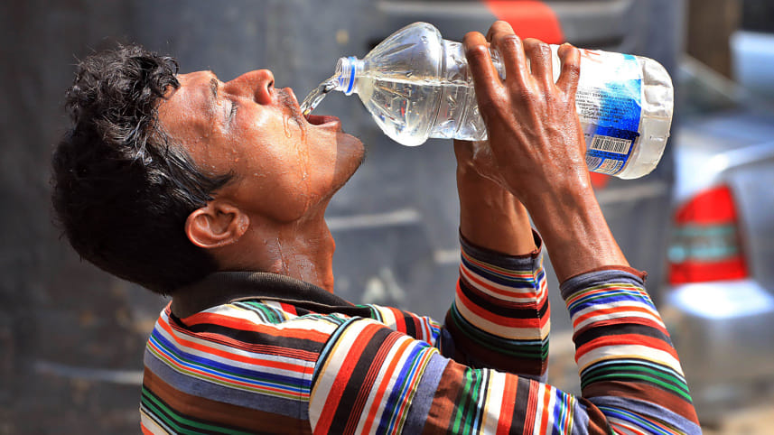 A worker drinking water