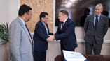 Khalilur with Rosatom CEO.jpg