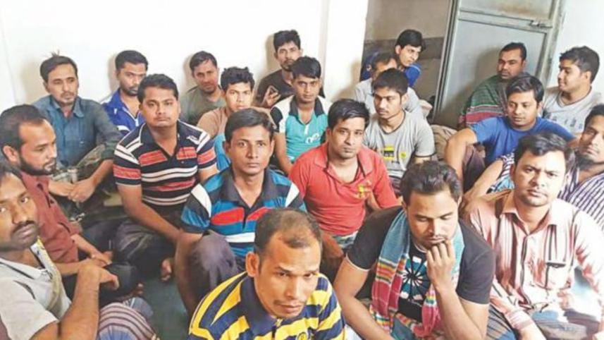 Bangladeshi migrant workers sitting at a factory in Herat city of Afghanistan. They have been stranded there for over seven months.  Photo: Collected