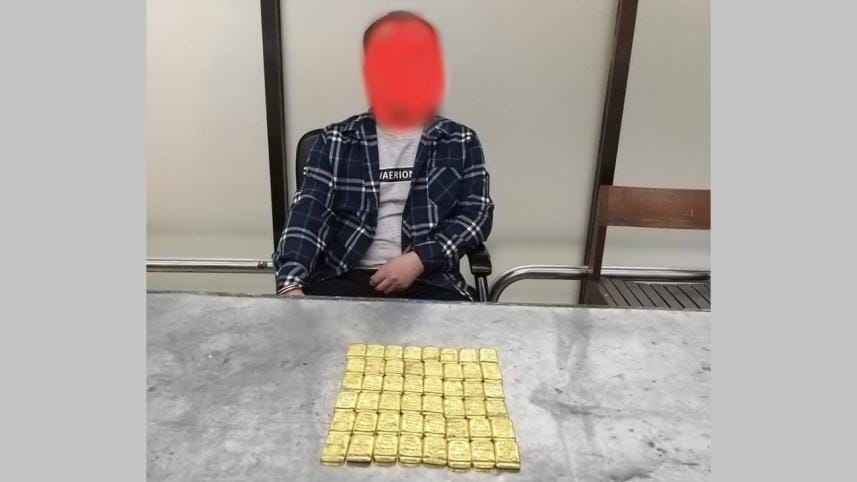 Customs officials detain a Chinese national on charge of smuggling in 48 gold bars at Dhaka airport