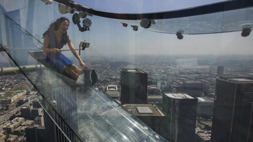 Woman slides down the Skyslide, a 45-foot 
