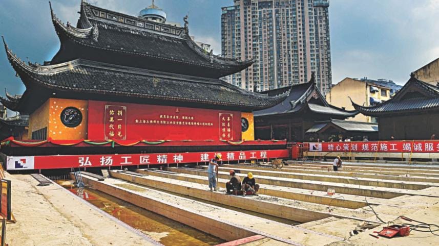 homes moved on rail.jpg