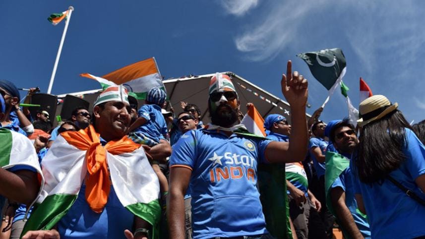 Fans of Pakistan's cricket team cheer in the stands before Pakistan's Cricket World Cup match against India 