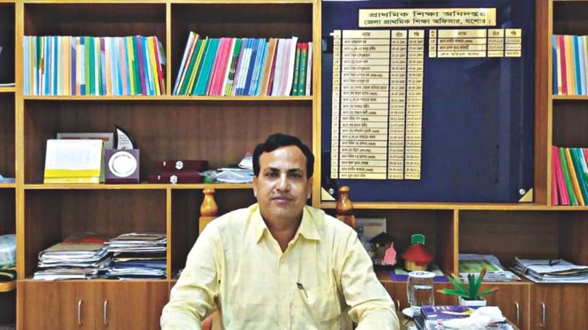 Jashore District Primary Education Officer Sheikh Ohidul Alam at his office