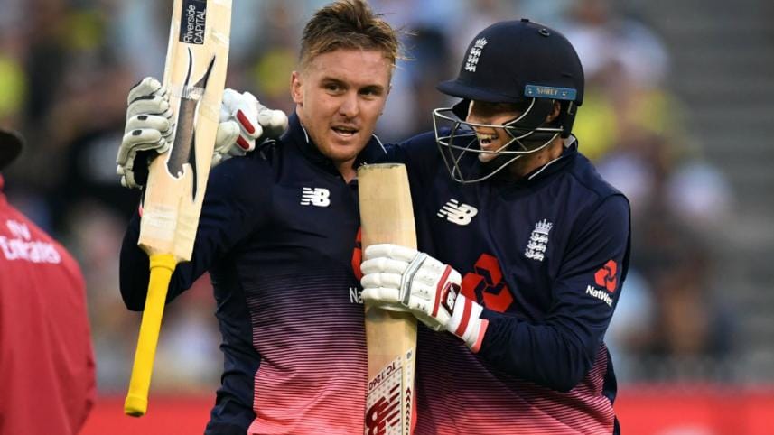 Jason Roy (L) celebrates with teammate Joe Root