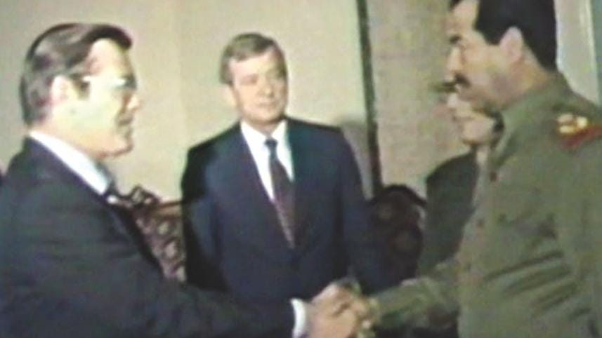 Iraqi president Saddam Hussein greets Donald Rumsfeld