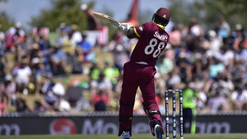West Indies batsman Darren Sammy plays a shot 