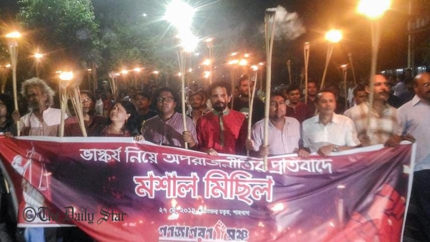 Torch-wielding march