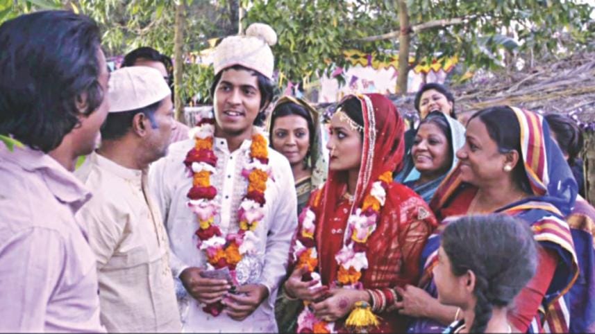 A scene from "Ujan Ganger Naiya". 