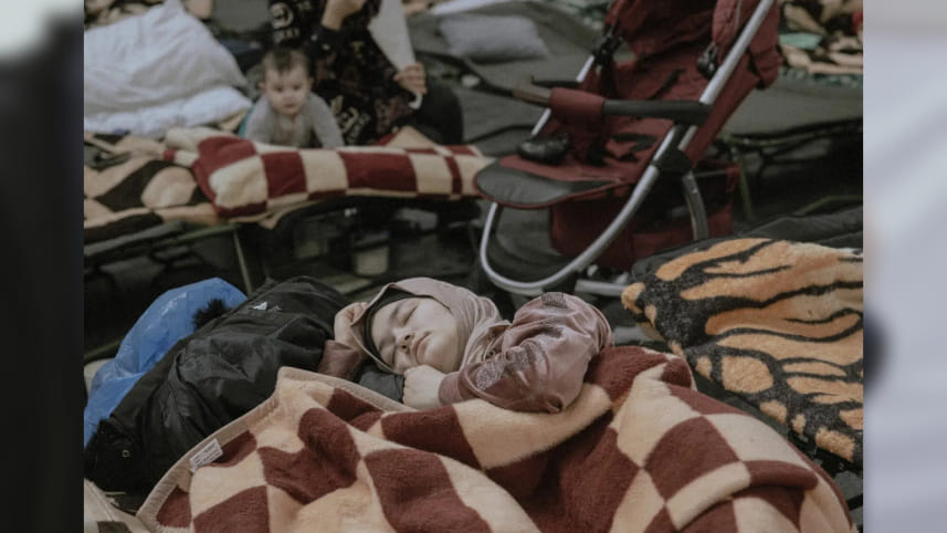 ismail-ferdous-ukraine-sleeping-child.