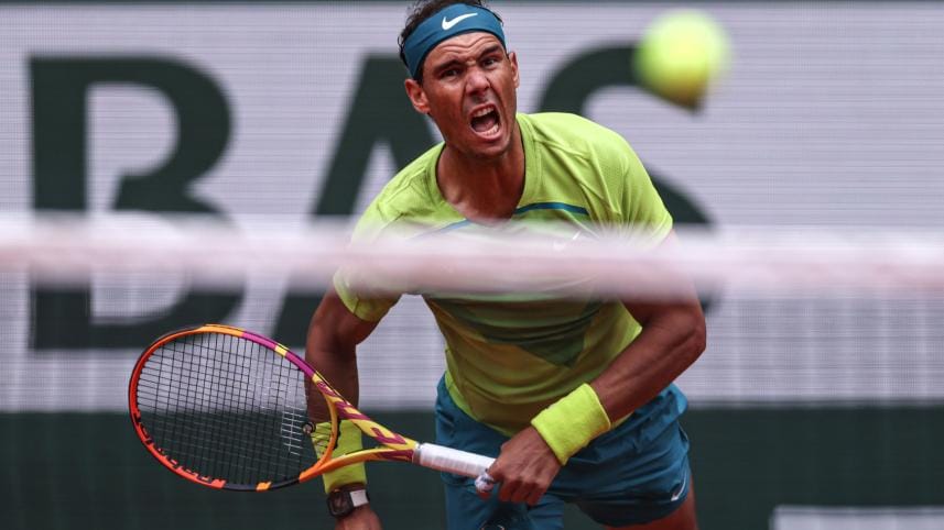 Spain's Rafael Nadal eyes the ball as he returns to Australia's Jordan Thompson during their men's singles match at the Court Philippe-Chatrier on day two of the Roland-Garros Open tennis tournament in Paris