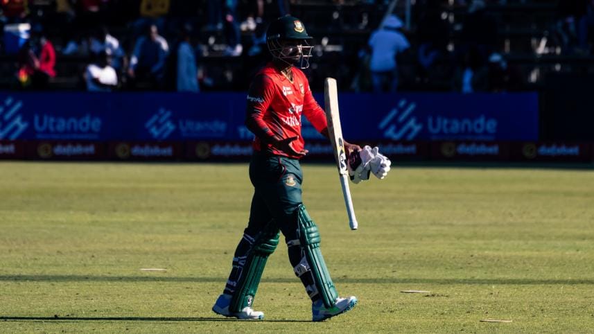 Liton Das walks back after getting dismissed. 