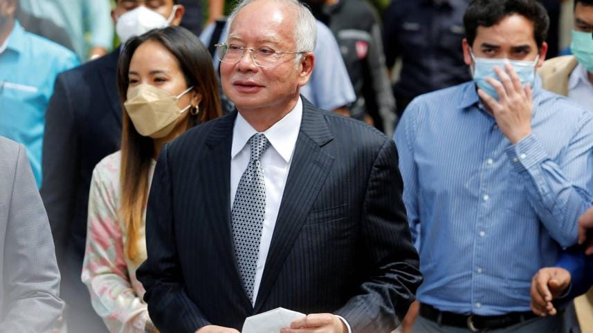 former_malaysia_prime_minister_najib_razak_walks_out_of_federal_court_-_reuters.jpg