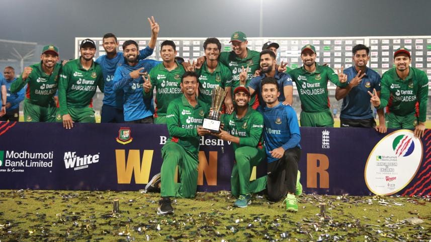 Bangladesh players pose with Trophy