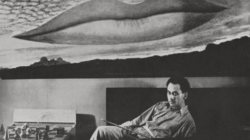 man_ray_with-_a_lheure_de_lobservatoire_les_amoureux_on_background.jpg