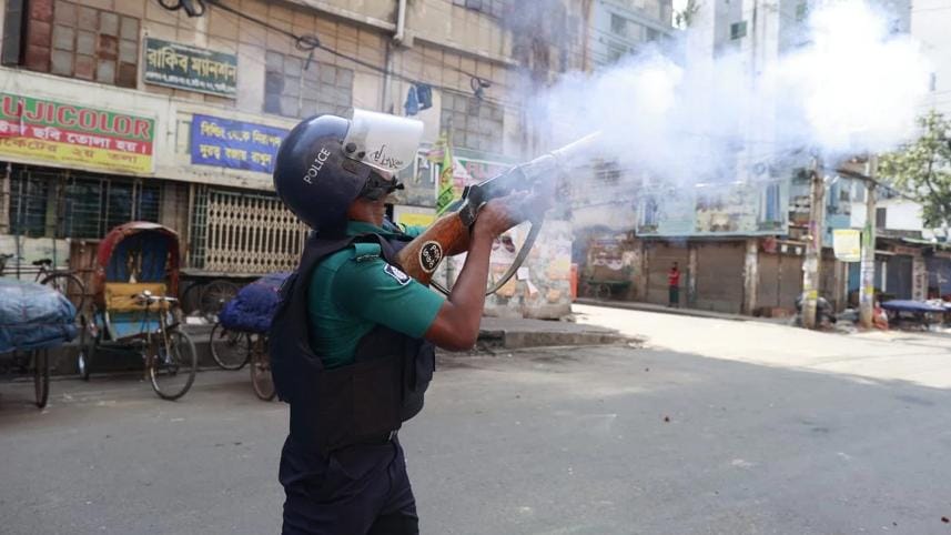 Police used teargas and sound grenades to scatter factory workers in Mirpur