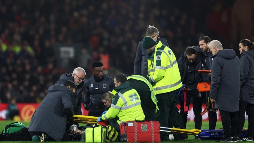  Luton Town's Tom Lockyer receives medical attention vs Bournemouth 
