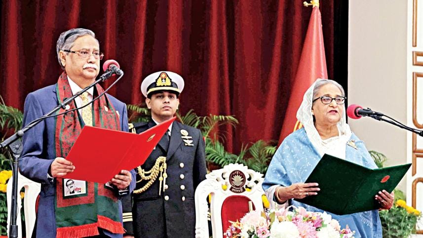 President Mohammed Shahabuddin swears in Awami League President Sheikh Hasina as prime minister at the Bangabhaban yesterday evening.