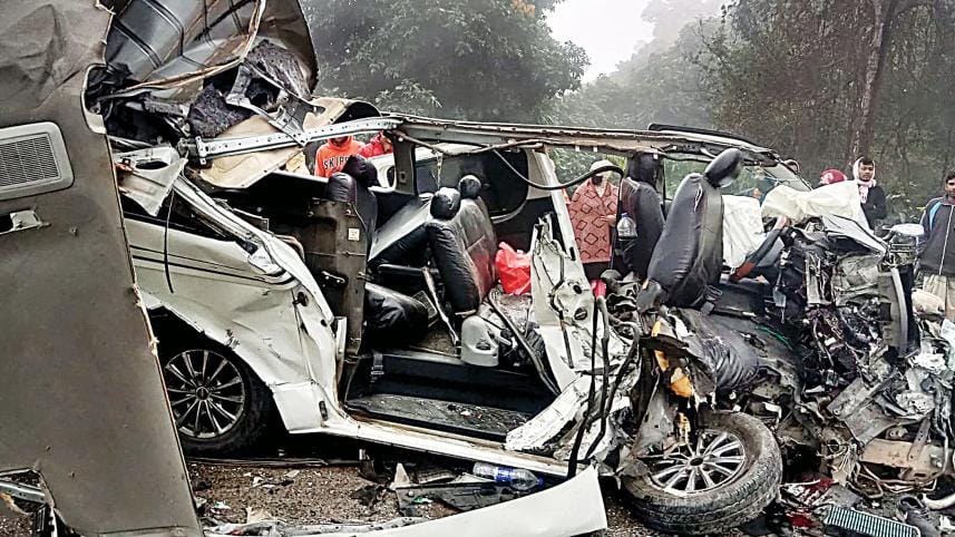 The wreckage of the microbus that was hit by a bus on Dashuria-Kushtia highway in Pabna yesterday. 