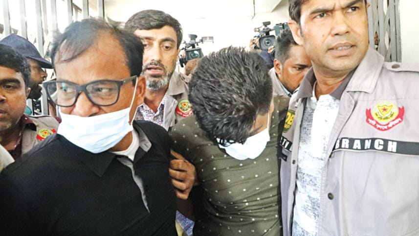 Accused Amanullah and Tanvir Bhuiyan being taken to a Dhaka court yesterday.