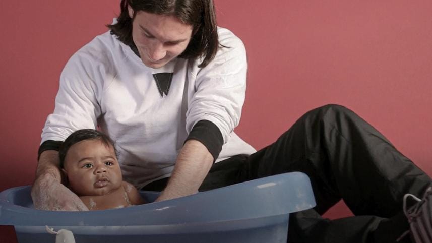 Lionel Messi and a four-month-old Lamine Yamal.jpg