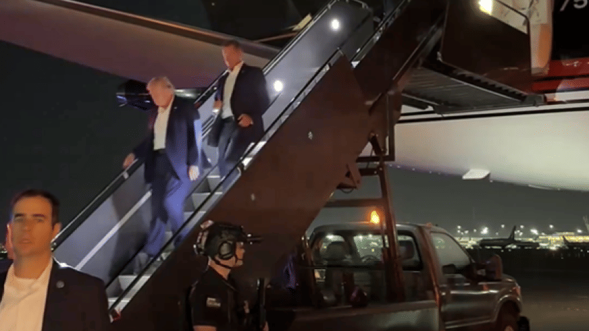 Trump seen walking off his plane after shooting