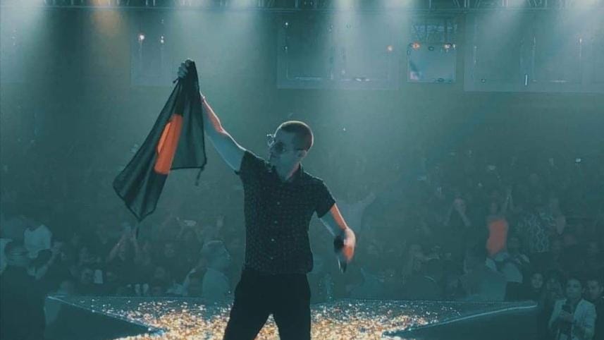 Akcent holds Bangladeshi flag up high