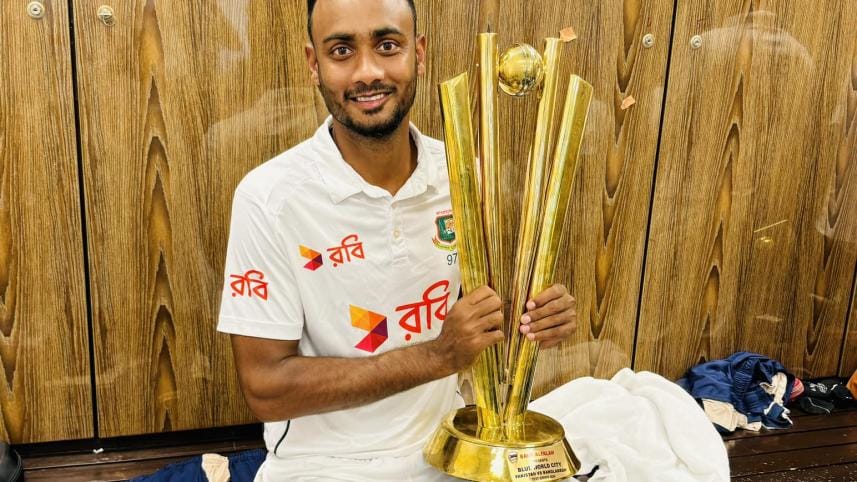 Shoriful islam with trophy 