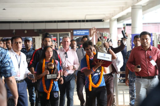 Bangladesh women's football team returns home