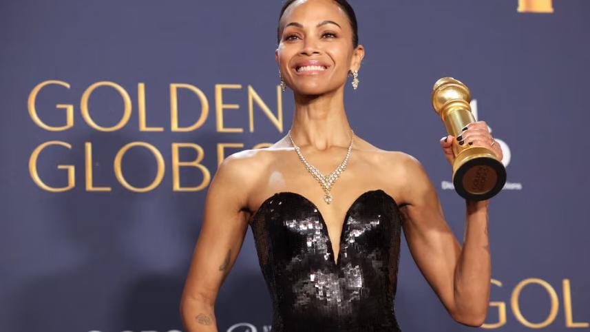 Zoe Saldana poses with the Best Performance by a Female Actor in a Supporting Role in An Motion Picture Award for "Emilia Perez," at the 82nd Golden Globe Awards.jpg