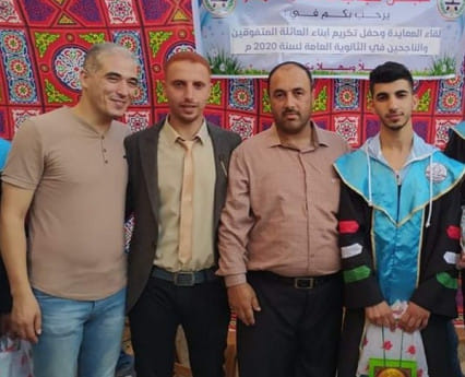 Ibrahim Saleem Kishko with his uncle and relatives