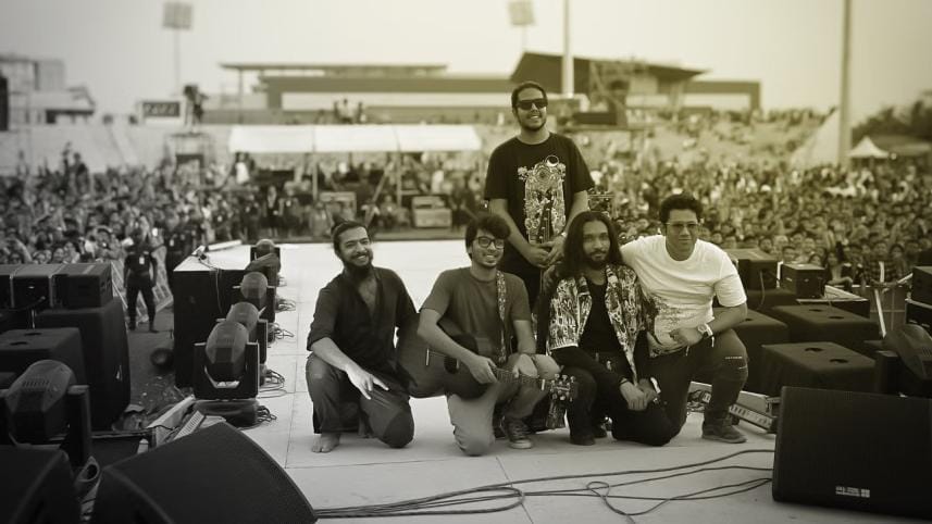 Kaaktaal posing for a photo on the stage