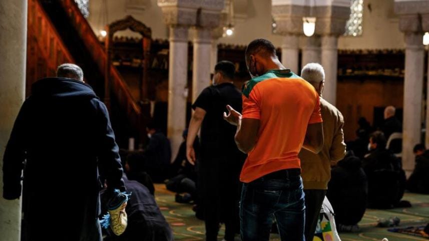 Muslims pray at the Grande Mosquée de Paris on April 13, 2021, a few hours before the start of Ramadan in France. 