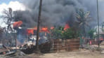 burning rohingya house.jpg