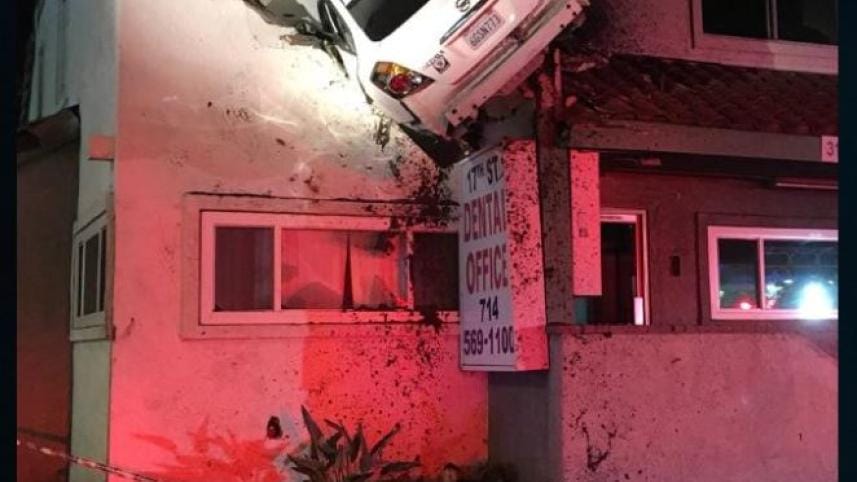 Car flies 20m into upper floor of building
