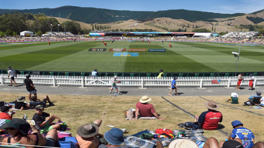 Spectators watch as Zimbabwe play the United Arab Emirates