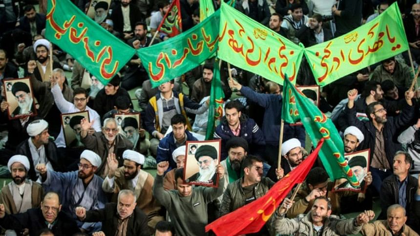 Iranians chant slogans Iranians chant slogans