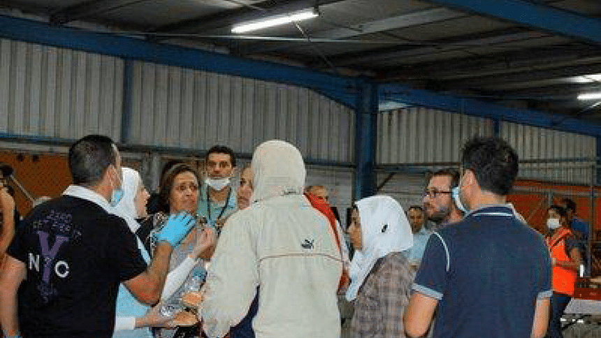 Refugees waiting to meet their families Refugees waiting to meet their families