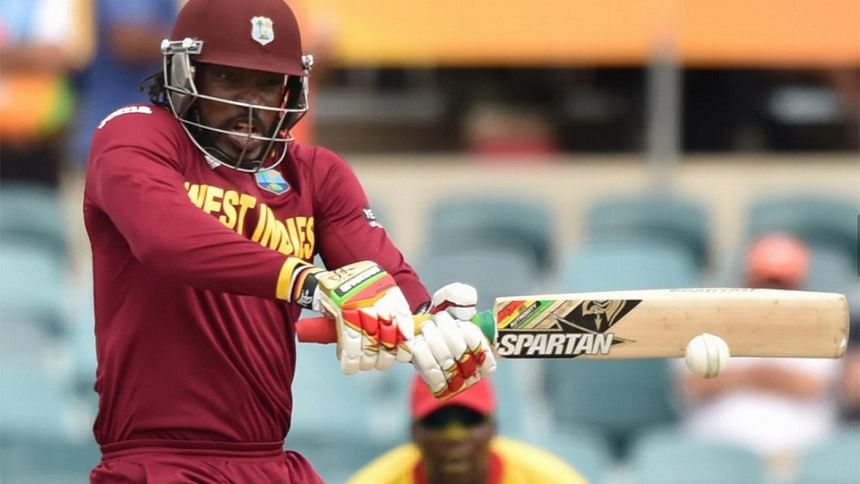 Chris Gayle smashes a boundary against Zimbabwe Chris Gayle smashes a boundary against Zimbabwe