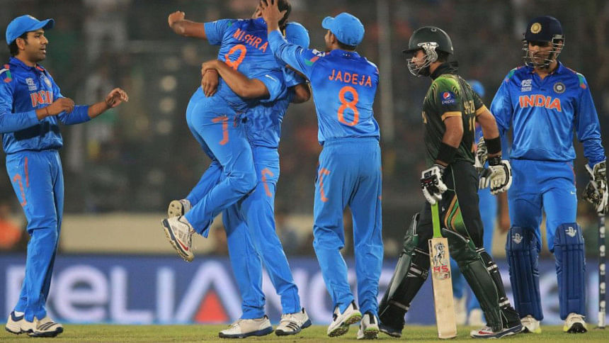 This file photo shows Indian cricketers celebrate fall of Pakistani wicket
