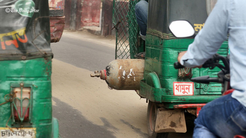 auto-rickshaw carries gas cylinder auto-rickshaw carries gas cylinder
