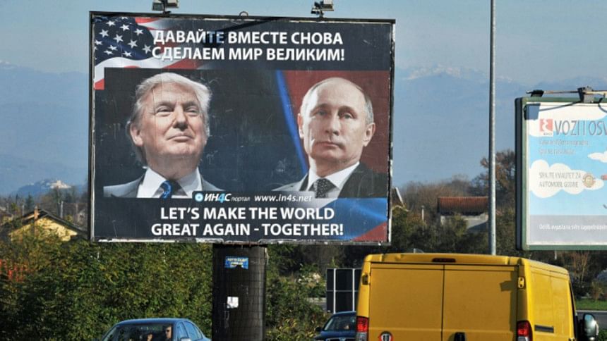 A billboard showing US President-elect Donald Trump and Russian President Vladimir Putin A billboard showing US President-elect Donald Trump and Russian President Vladimir Putin