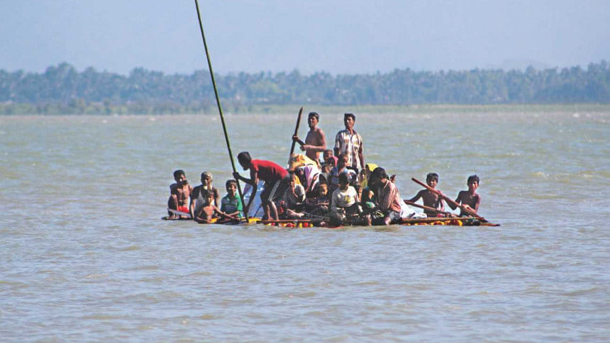 Rohingyas floating on makeshift... Rohingyas floating on makeshift...